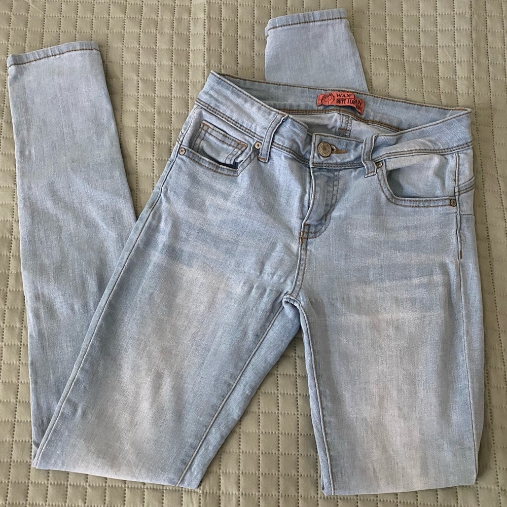 Light wash skinny jeans. Fits like a size 2